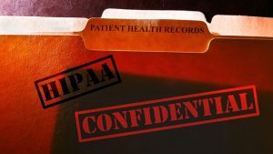 Confidential file with hipaa written on it looks foreboding