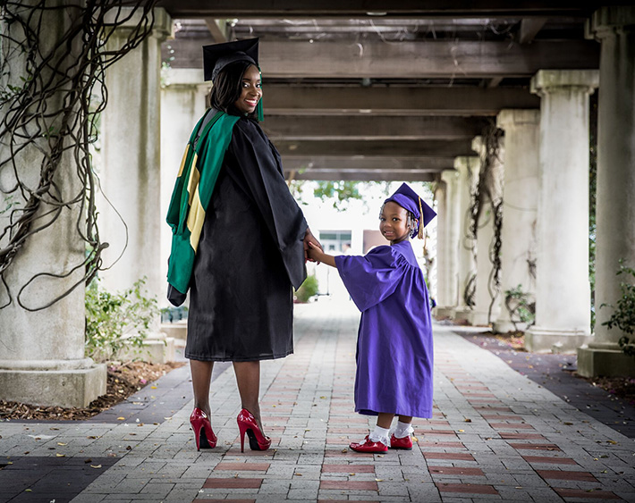 usf graduate at graduation with her daughter