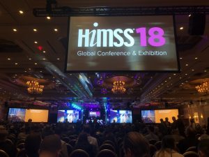 himss 18 conference many people and many chairs in ballroom