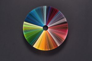 a color wheel made out of paper cards on their sides