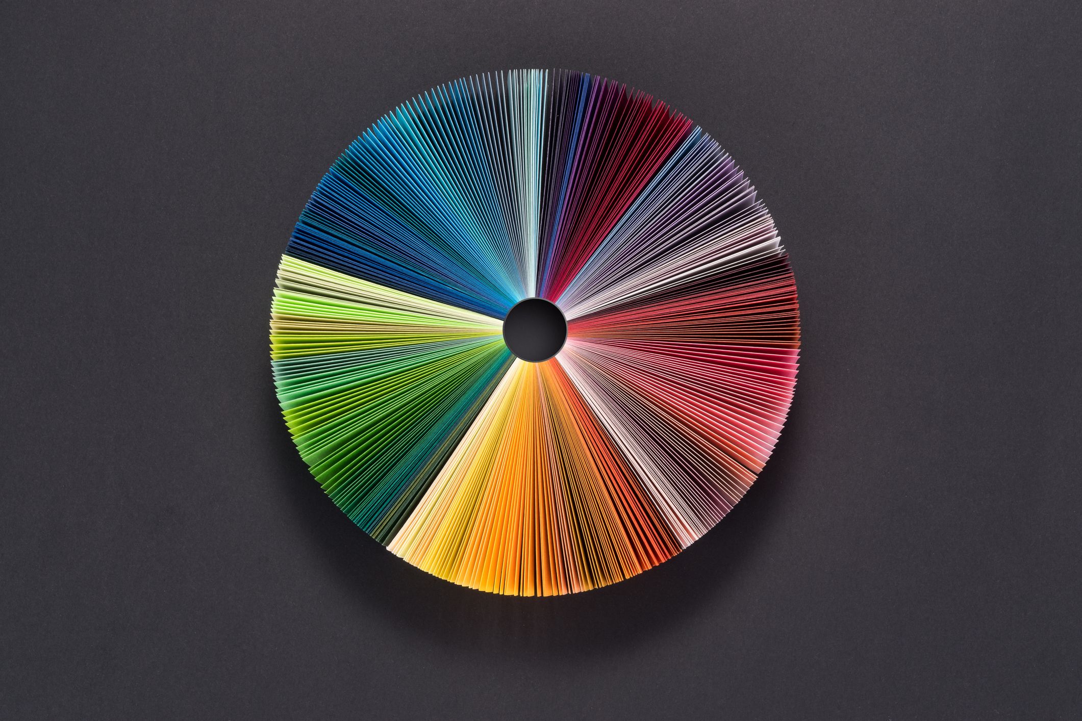 a color wheel made out of paper cards on their sides