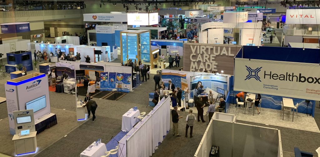 A shot from above of a health IT conference.